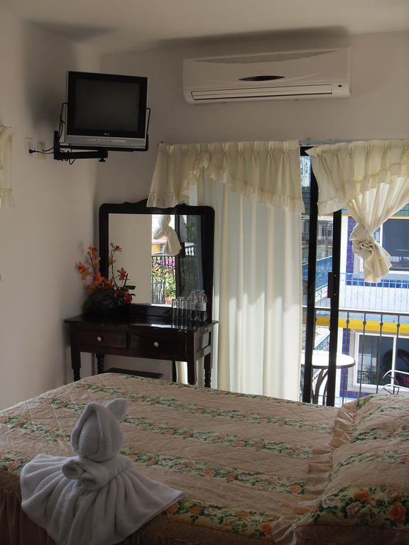 Hostal Del Cid Катемако Номер фото
